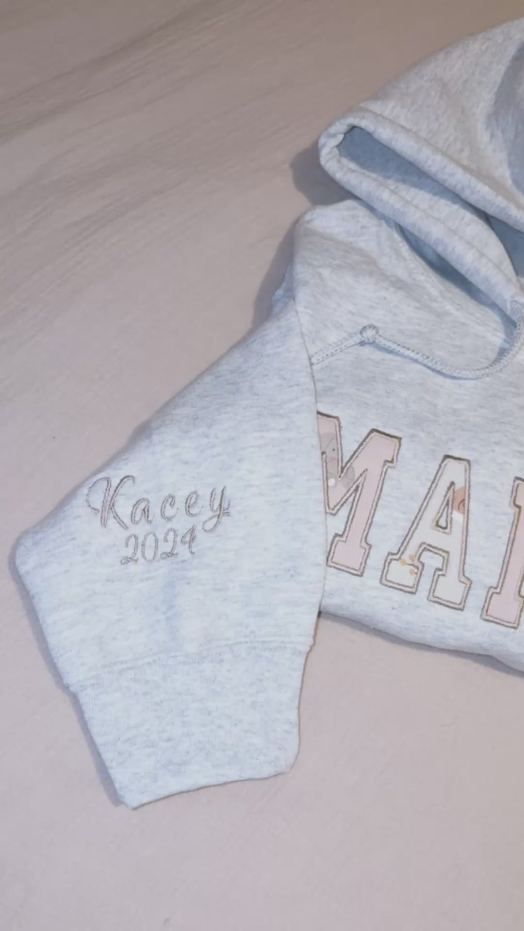 Sweater with baby clothes